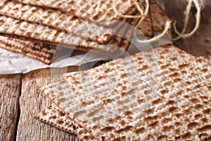 Jewish kosher matzah macro on a table. horizontal