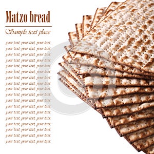 Jewish kosher matzo for Passover macro isolated on white. text