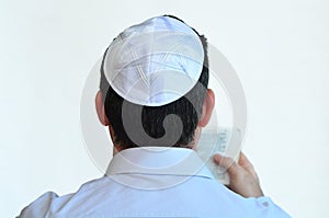 Jewish man with kippah pray