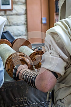 Jewish man praying in a synagogue