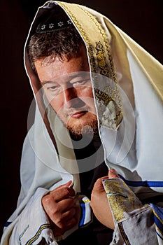 Jewish man in wrapped talit pray religious orthodox Jew with prays