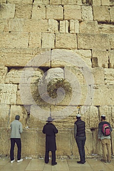 Jewish men praying at the sacred Wailing Wall, Western Wall, Jerusalem, Israel