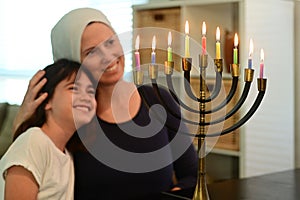 Jewish mother and daughter happy on Hanukkah Jewish holiday