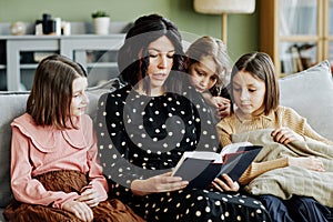 Jewish Mother Reading Book To Children