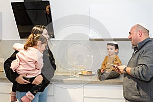 Jewish parents and children celebrating Hanukkah Israel holiday.