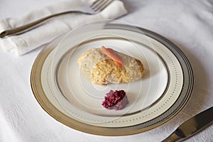 Jewish passover appetiser of gefilte fish and horseradish photo