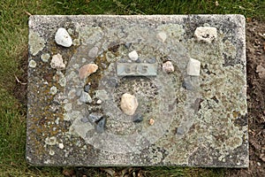 Jewish stones put on the grave an unknown victim of the Ghetto T