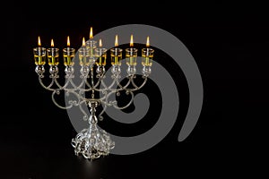 Jewish traditional lights holiday symbol Hanukkah Judaism menorah with are burning oil candles
