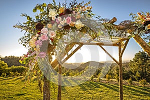 Jewish traditions wedding ceremony. Wedding canopy chuppah or huppah decorated with flowers