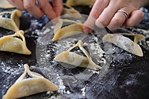 Jewish woman preparing Hamantash cookies