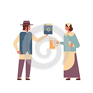 Jews couple holding bible book and jug jewish man woman in traditional clothes standing together happy hanukkah judaism