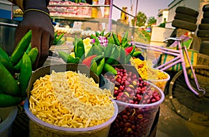 Jhalmuri mixture chaat being sold by a fast food vendor