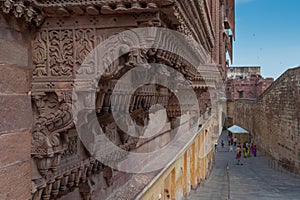 Jharokha, stone window projecting from the wall face of a building, in an upper story, overlooking Mehrangarh fort, Jodhpur,