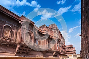 Jharokha, stone window projecting from the wall, in an upper story,overlooking Mehrangarh fort, Jodhpur, Rajasthan, India. Jhanki