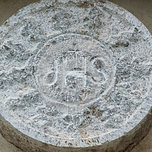 JHS Christogram of the stone above the lateral entrance of church of San Francesco, Scutari photo