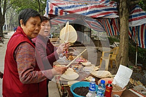 Jiangmen Xinhui, China: street vendors