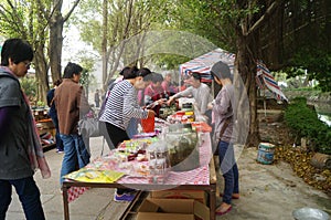 Jiangmen Xinhui, China: street vendors