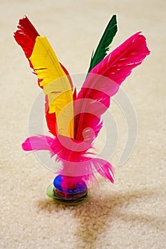 Jianzi or Kikbo shuttlecock, Chinese game for exercise or competition.