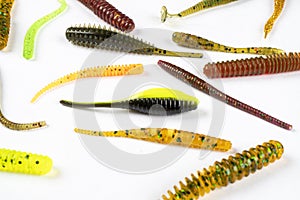 Jig silicone fishing lures isolated on a white background. Silicone fishing baits isolated. Colorful baits. Fishing spinning bait
