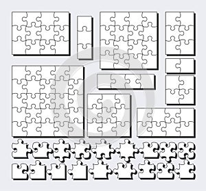 Jigsaw puzzle background with many white pieces. Abstract mosaic template