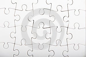 Jigsaw puzzle with blank white pieces