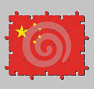Jigsaw puzzle of China flag in a large golden star within an arc of four smaller golden stars on red.
