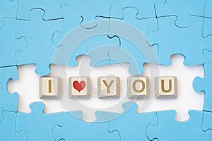 Jigsaw puzzle with computer keyboard buttons with I Love You text