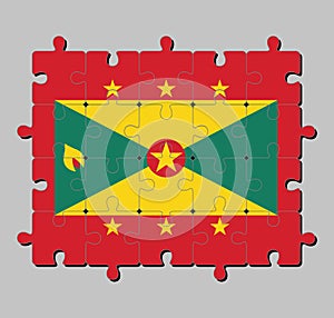 Jigsaw puzzle of Grenada flag in red border with six Gold star, Gold and green triangles with red disk.