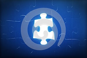 Jigsaw puzzle piece missing. Light glowing. Solution