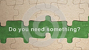 Jigsaw puzzle piece with text of \'Do you need something