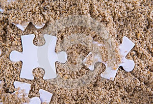 Jigsaw Puzzle Pieces Buried In Sand V