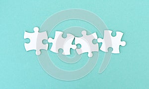 Jigsaw puzzle pieces in row