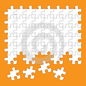 Jigsaw puzzle pieces white on orange background
