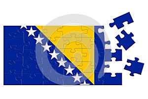 A jigsaw puzzle with a print of the flag of Bosnia and Herzegovina, some pieces of the puzzle are scattered or disconnected.