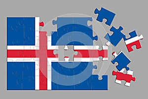 A jigsaw puzzle with a print of the flag of Iceland, some pieces of the puzzle are scattered or disconnected. Isolated background