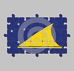 Jigsaw puzzle of Tokelau flag in light blue field with the large yellow disk shifted slightly to the hoist-side of center.