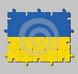 Jigsaw puzzle of Ukraine flag in a banner of two equally sized horizontal bands of blue and yellow.