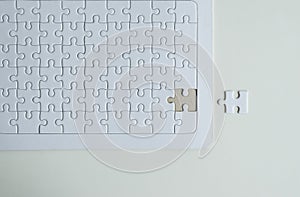 Jigsaw puzzle white color,Puzzle pieces grid,Close up,Top view copy space for text