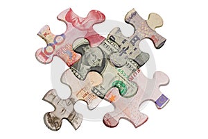 Jigsaw puzzles and world major currencies photo