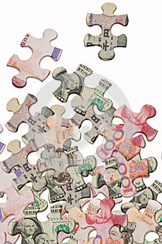 Jigsaw puzzles and world major currencies photo