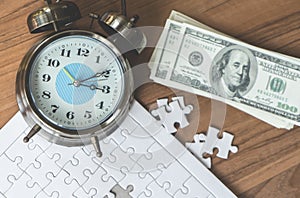 Jigsaws last with time counting down for financial solution concept