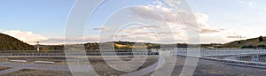 The Jindabyne Dam wall viewing area with mountain background