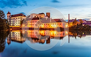 Jindrichuv Hradec Castle by night. Reflection in the water. Czech Republic