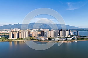 Jiujiang cityscape with mountains-water