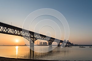 Jiujiang yangtze river bridge in sunrise