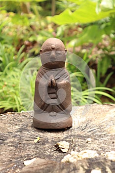 Jizo Bosatsu mini statue in the garden.
