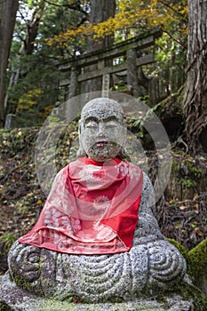 Jizo Statue in Ancient Graveyard of Okunoin Cemetery, Koyasan, Japan