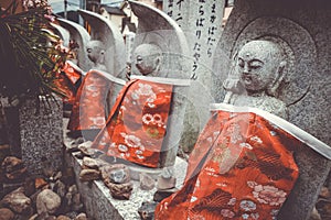 Jizo statues in Arashiyama temple, Kyoto, Japan