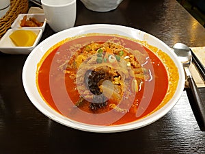 Jjamppong, Korean noodle soup with red, spicy seafood based broth flavored with chili powder.