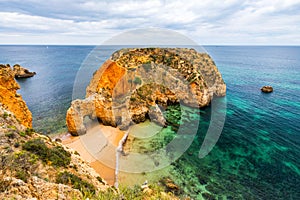 Joao de Arens beach (Praia JoÃÂ£o de Arens), Algarve, Portimao, Portugal. Remote beach, hidden beach, Praia da Ponta Joao de Arens photo